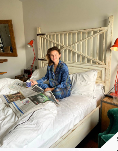 Person checking phone in quiet morning during long distance relationship